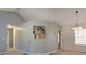 Dining room with unique lighting fixture and view into kitchen area at 189 Meadow Spring Dr, Temple, GA 30179