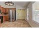 Kitchen with stainless steel appliances and wood cabinets at 189 Meadow Spring Dr, Temple, GA 30179