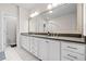 Spacious bathroom with a double sink vanity, lots of cabinets and a walk-in shower at 1949 Skyfall Cir, Brookhaven, GA 30319