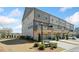 Multi-level townhomes with private garages, wooden decks, and brick and siding at 1949 Skyfall Cir, Brookhaven, GA 30319