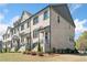 Well-maintained townhomes with brick exteriors, stylish porches, and landscaped grounds at 1949 Skyfall Cir, Brookhaven, GA 30319