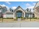Exterior day shot of leasing office with professional landscaping at 1949 Skyfall Cir, Brookhaven, GA 30319
