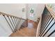 Entryway featuring a hardwood staircase with black iron railings and a view of the front door at 1949 Skyfall Cir, Brookhaven, GA 30319