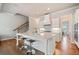 Bright, updated kitchen featuring a large island with seating and stainless steel appliances at 1949 Skyfall Cir, Brookhaven, GA 30319