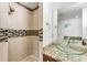 Bathroom featuring a bowl sink, tile shower and granite countertops at 2520 Laurel Nw Cir, Atlanta, GA 30311