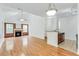Bright open-concept living room with hardwood floors and fireplace at 2520 Laurel Nw Cir, Atlanta, GA 30311