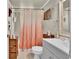 Well-lit bathroom with a shower-tub combination and vanity at 5505 Longmeadow Ln, College Park, GA 30349