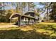 Lovely two-story home featuring a convenient carport and well-maintained yard at 5505 Longmeadow Ln, College Park, GA 30349
