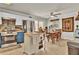 Bright kitchen featuring stainless steel appliances, and an adjacent dining area at 5505 Longmeadow Ln, College Park, GA 30349