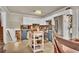 Modern kitchen with stainless steel appliances, ample counter space, and stairs to basement at 5505 Longmeadow Ln, College Park, GA 30349