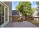 Wooden deck with rails, stairs to the yard, and french doors to the house at 109 Bowen Sw Cir, Atlanta, GA 30315