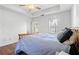 Bedroom with plush carpet, ceiling fan, and ample natural light at 109 Bowen Sw Cir, Atlanta, GA 30315