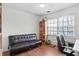 Bedroom features modern furnishings, hardwood floors, and great natural light at 109 Bowen Sw Cir, Atlanta, GA 30315