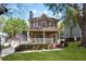 Charming two-story home with a welcoming front porch and well-maintained landscaping at 109 Bowen Sw Cir, Atlanta, GA 30315