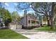 Two-story home featuring a two-car garage and a charming front porch at 109 Bowen Sw Cir, Atlanta, GA 30315