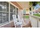 Relax on the charming front porch with rocking chairs at 109 Bowen Sw Cir, Atlanta, GA 30315