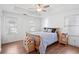 Spacious main bedroom with tray ceiling, hardwood floors and two windows at 109 Bowen Sw Cir, Atlanta, GA 30315
