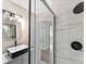 Modern bathroom featuring a sleek shower and sink with light gray tile at 1703 Derrill Dr, Decatur, GA 30032