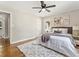 Comfortable bedroom with hardwood floors, a cozy rug, and ample natural light at 1703 Derrill Dr, Decatur, GA 30032