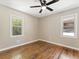 An empty bedroom with hardwood floors and natural light at 1703 Derrill Dr, Decatur, GA 30032