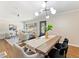 Charming dining area, perfect for gatherings, featuring a sleek table and modern chairs at 1703 Derrill Dr, Decatur, GA 30032