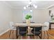 Modern dining area with stylish chairs and contemporary lighting at 1703 Derrill Dr, Decatur, GA 30032