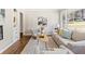 Bright living room featuring a fireplace and comfortable seating near large windows at 1703 Derrill Dr, Decatur, GA 30032