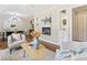 Elegant living room with a fireplace, built-in shelves, and comfortable seating at 1703 Derrill Dr, Decatur, GA 30032