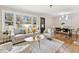Inviting living area showcasing a cozy seating arrangement and natural light at 1703 Derrill Dr, Decatur, GA 30032
