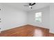 A simple yet elegant bedroom with beautiful hardwood floors at 382 Deckner Sw Ave, Atlanta, GA 30310