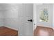 A well-organized walk-in closet offers ample storage solutions in a clean and bright space at 382 Deckner Sw Ave, Atlanta, GA 30310