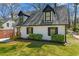 Attractive two-story house with new landscaping, a manicured lawn, and a welcoming entryway at 382 Deckner Sw Ave, Atlanta, GA 30310
