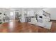 Spacious open-concept with hardwood floors, modern kitchen, and dining area at 382 Deckner Sw Ave, Atlanta, GA 30310