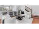 Stylish living room with open layout, breakfast bar, sleek furniture, and hardwood floors at 382 Deckner Sw Ave, Atlanta, GA 30310