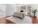 This main bedroom offers bright, natural light and neutral decor, and has an attached bathroom at 382 Deckner Sw Ave, Atlanta, GA 30310