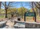The entrance to Emma Millican Park featuring green foliage and stone walkway at 382 Deckner Sw Ave, Atlanta, GA 30310