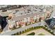 Aerial view showcases the property amidst a vibrant cityscape and lush greenery at 400 17Th Nw St # 1133, Atlanta, GA 30363