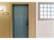 Condo front door with apartment number and glass block window for a modern design at 400 17Th Nw St # 1133, Atlanta, GA 30363