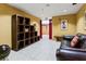 Cozy lobby with comfortable leather seating, decorative shelving, and modern artwork at 400 17Th Nw St # 1133, Atlanta, GA 30363