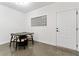 Dining room with table, four chairs, a window and an exterior door at 400 17Th Nw St # 1133, Atlanta, GA 30363