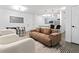 Open living room with kitchen and dining area featuring modern fixtures at 400 17Th Nw St # 1133, Atlanta, GA 30363