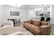Open living room with kitchen and dining area featuring modern fixtures at 400 17Th Nw St # 1133, Atlanta, GA 30363