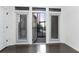 Well-lit room with windows and door, leads to a cozy, private outdoor patio at 400 17Th Nw St # 1133, Atlanta, GA 30363