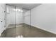 A generously sized walk-in closet with shelving units and mirrors that create a spacious feel at 400 17Th Nw St # 1133, Atlanta, GA 30363
