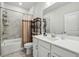 Bathroom with a single vanity, bath tub and tiled shower at 4257 Freight St, Tucker, GA 30084