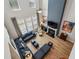 Bright living room with high ceilings, a fireplace, and large windows at 4257 Freight St, Tucker, GA 30084