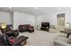 Large living room with comfortable seating and neutral decor at 4257 Freight St, Tucker, GA 30084