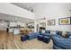 Bright living space with an open floor plan, connecting the living room, kitchen, and dining areas at 4257 Freight St, Tucker, GA 30084