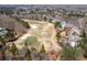 Scenic aerial view showcasing the property's proximity to a golf course and lush green spaces at 1037 Windermere Xing, Cumming, GA 30041