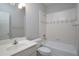 Bathroom features vanity sink and tub with white tiling at 1037 Windermere Xing, Cumming, GA 30041